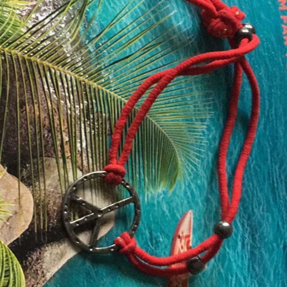 Red string peace bracelet